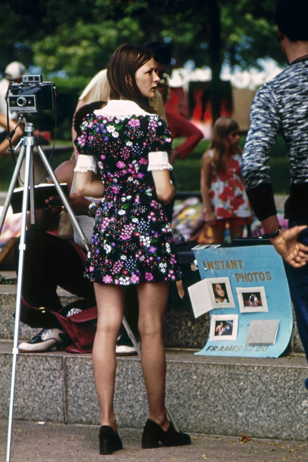 a group of people standing next to a person