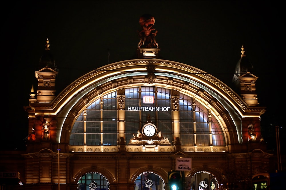 a large building with a clock on top of it