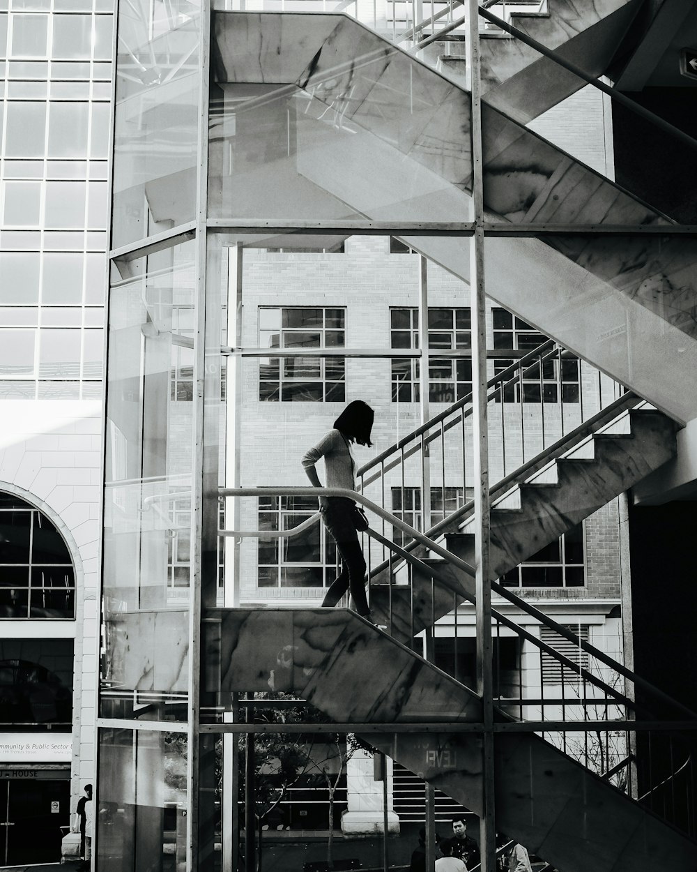 a man walking down a set of stairs