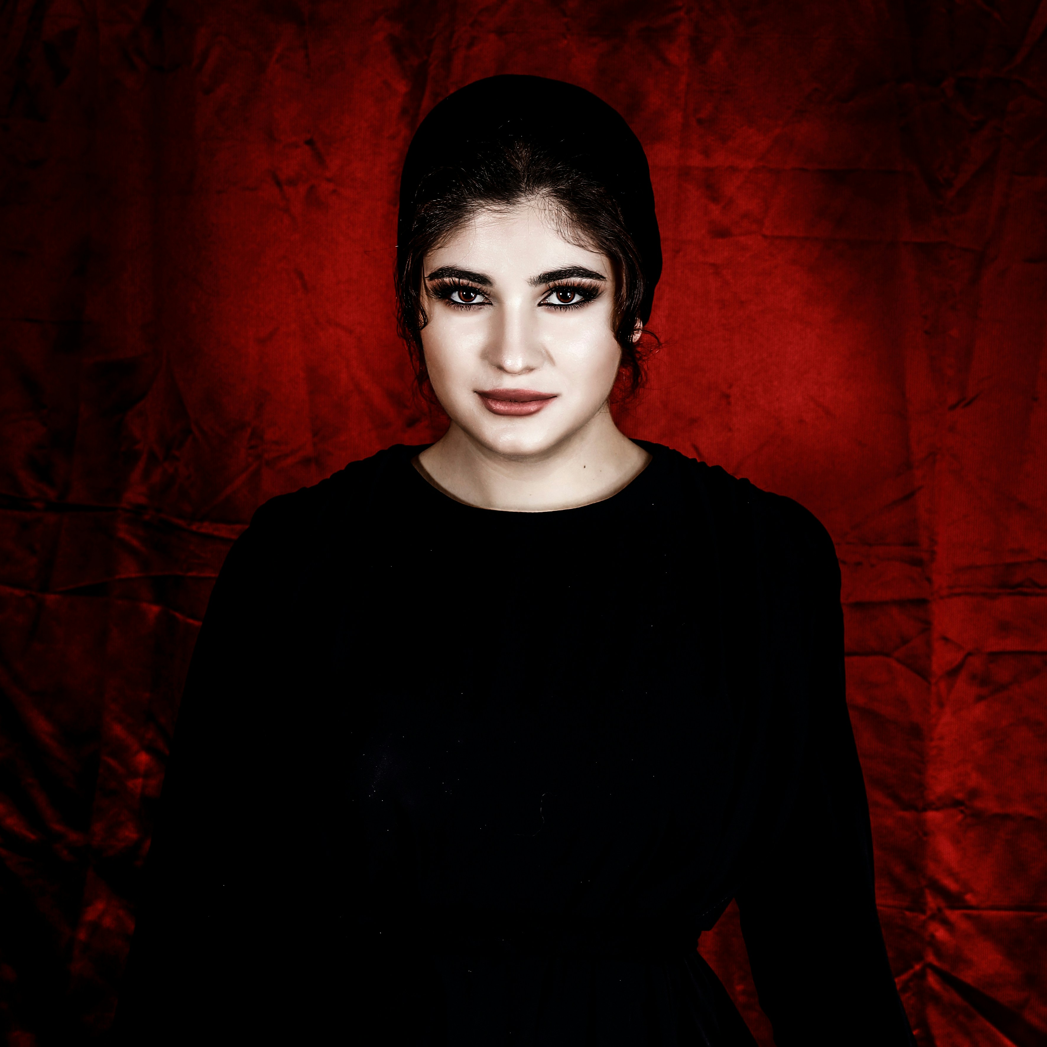 A woman in a black shirt posing for a picture photo – Free Black Image ...