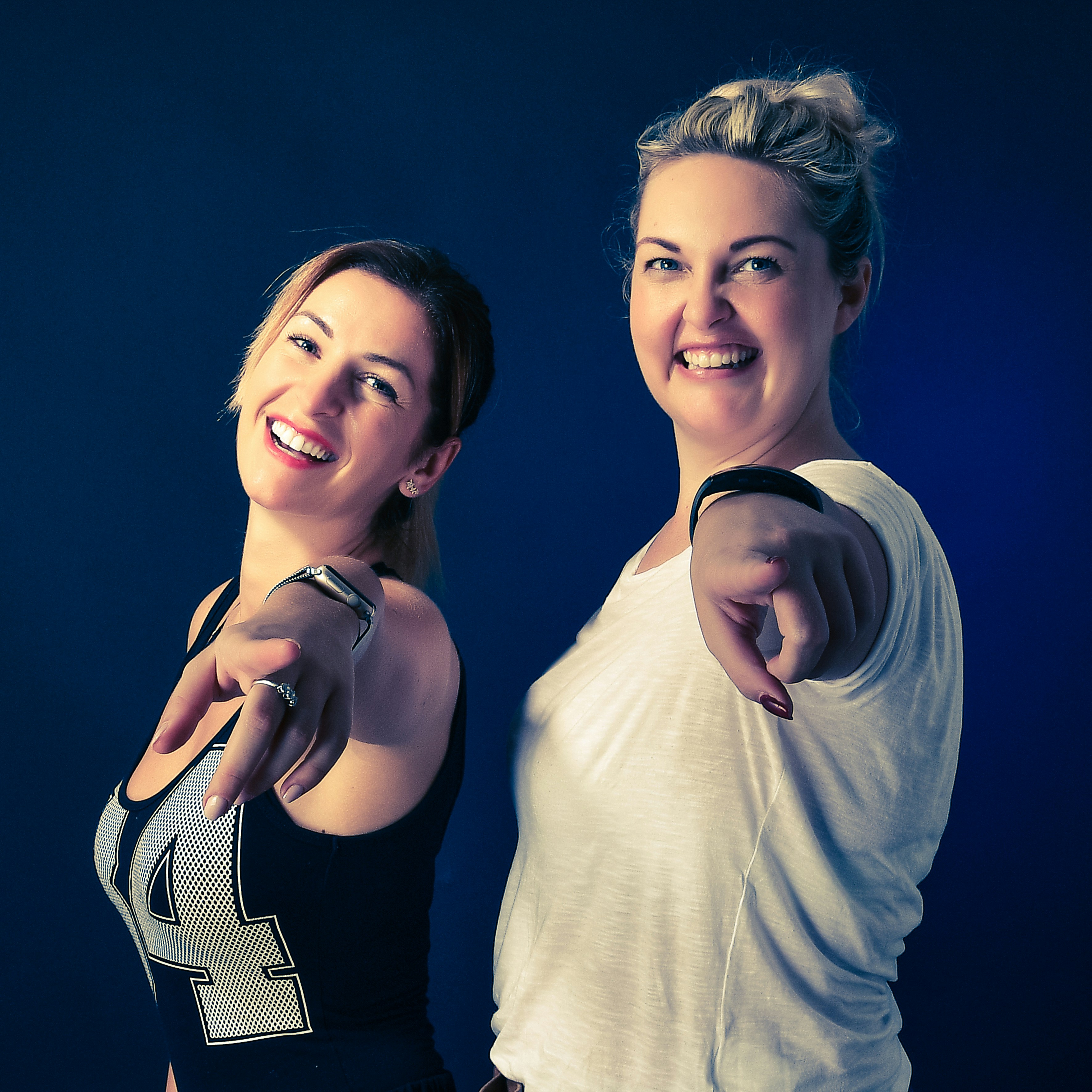 a couple of women standing next to each other