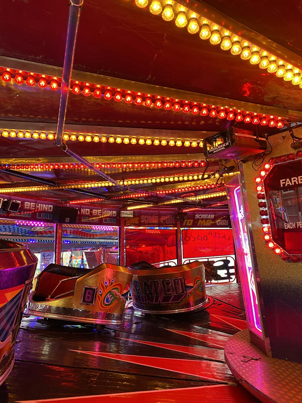 a carnival ride at night time with lights on