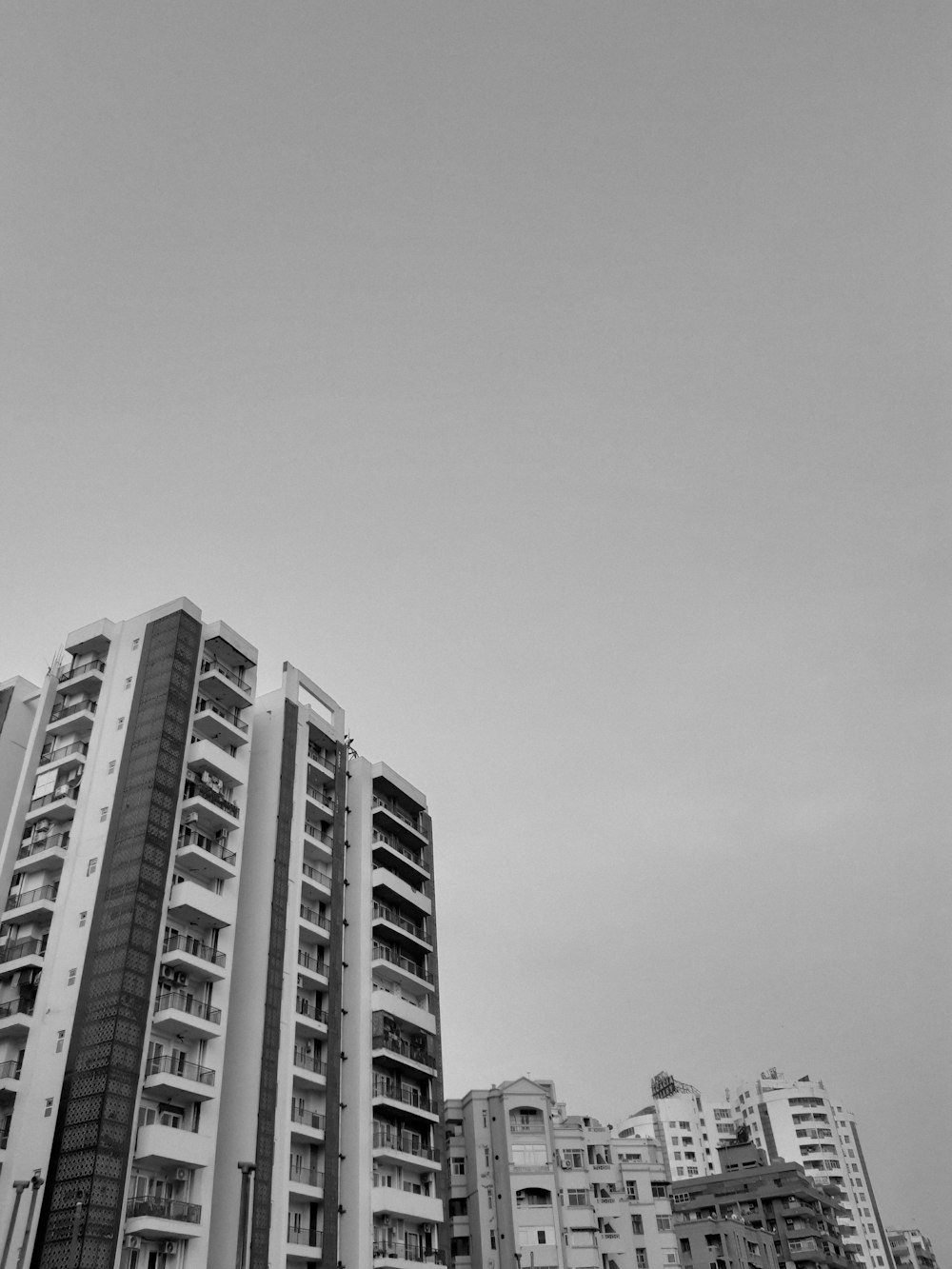 a black and white photo of a tall building