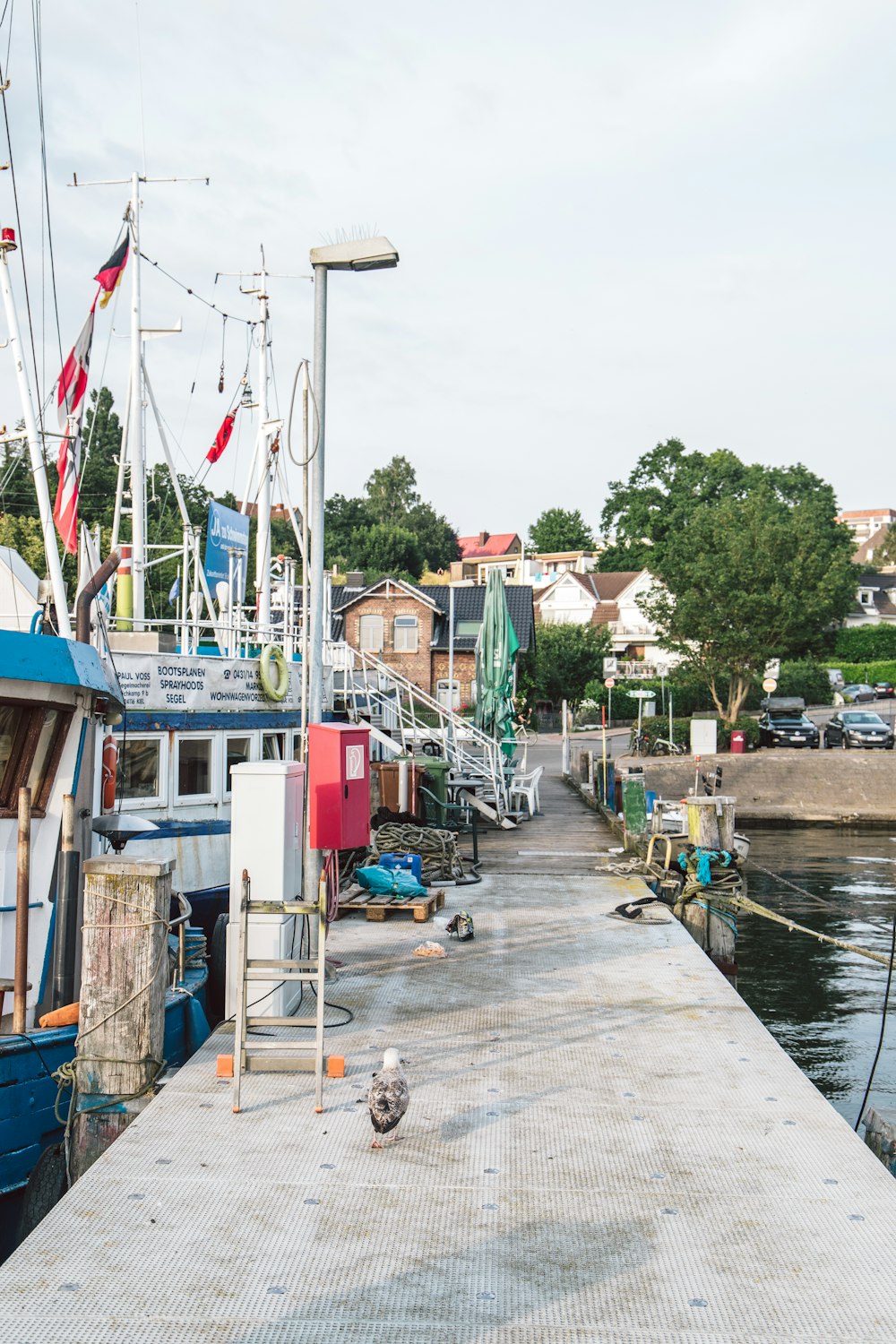 a dock with several boats docked at it