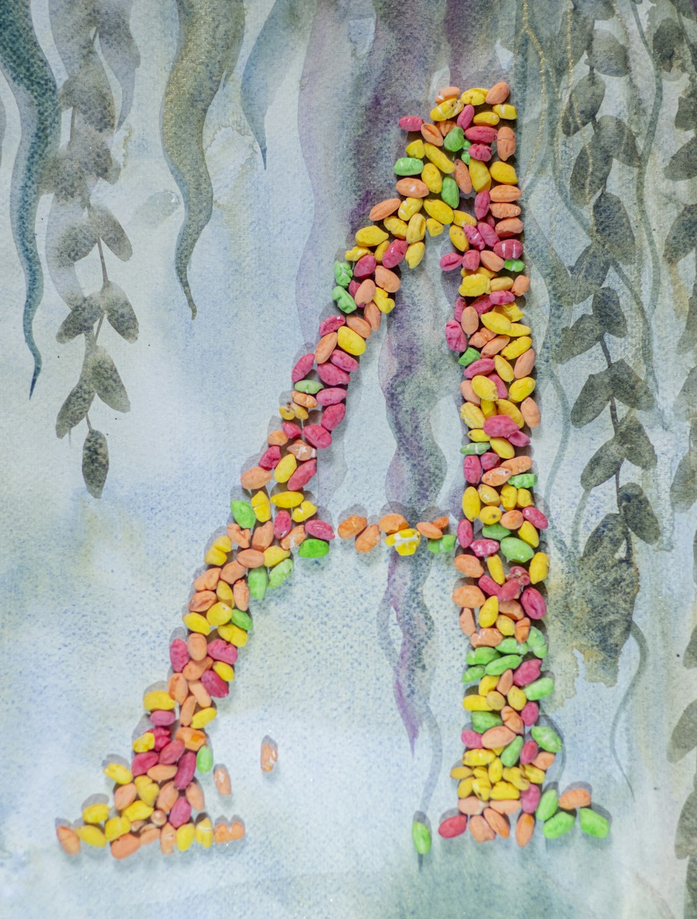 a painting of a letter made out of candy