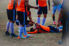 Chiropractor helping with joint pain and muscle strain from sports injuries