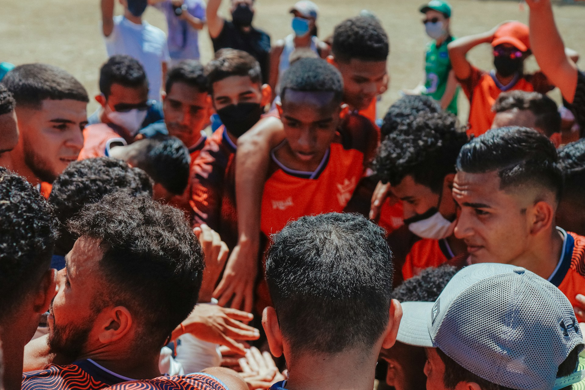 a group of young men standing next to each other