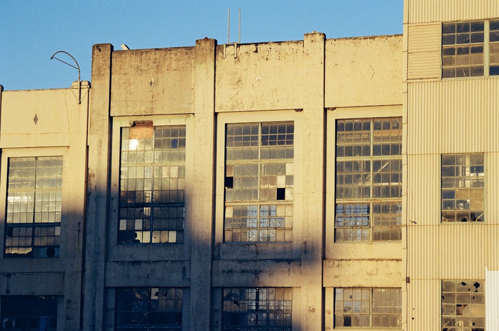 an old building with windows and a street light