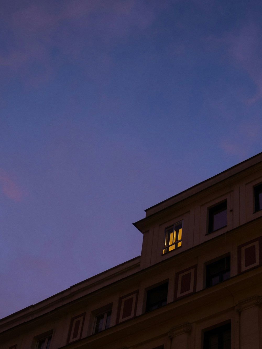 a building that has a clock on the side of it