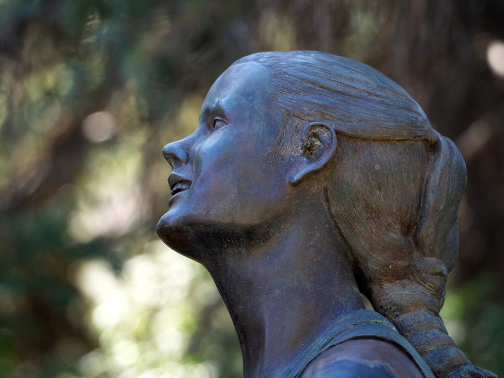 a close up of a statue of a woman