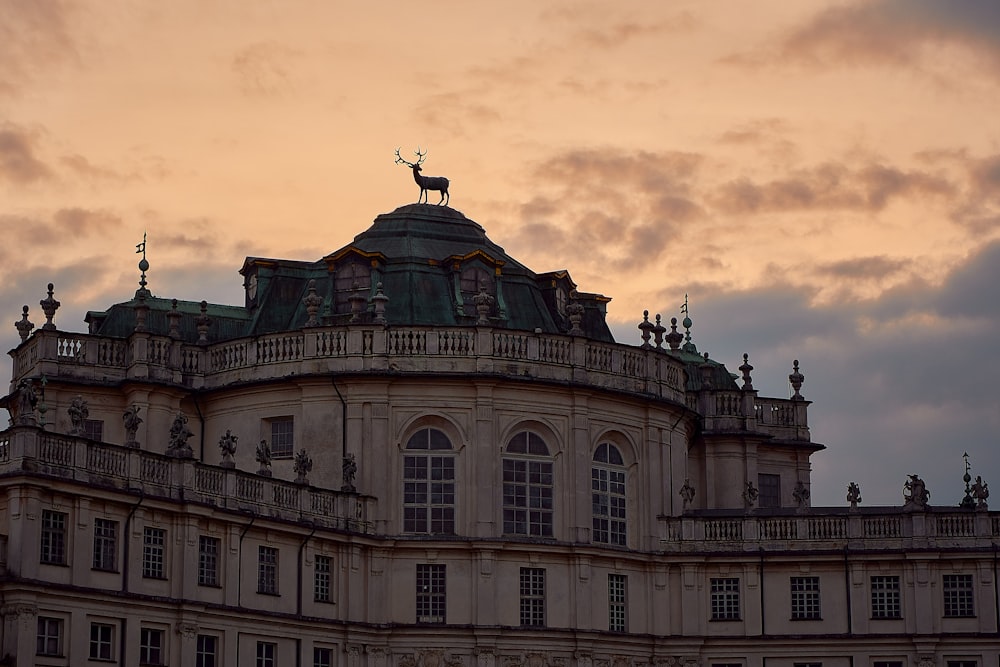 a large building with a clock on the top of it