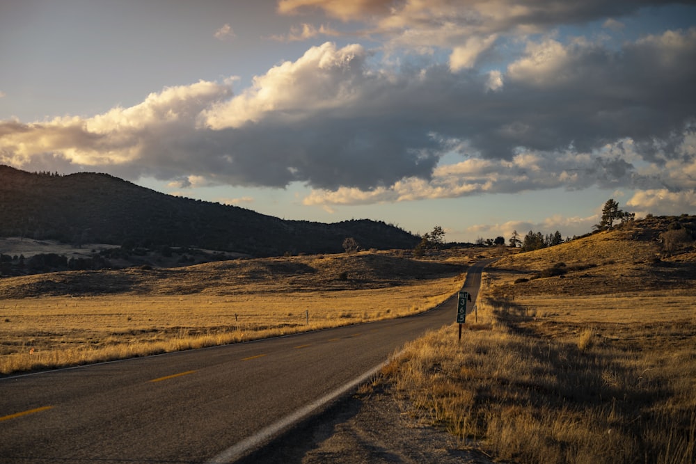 a person standing on the side of a road