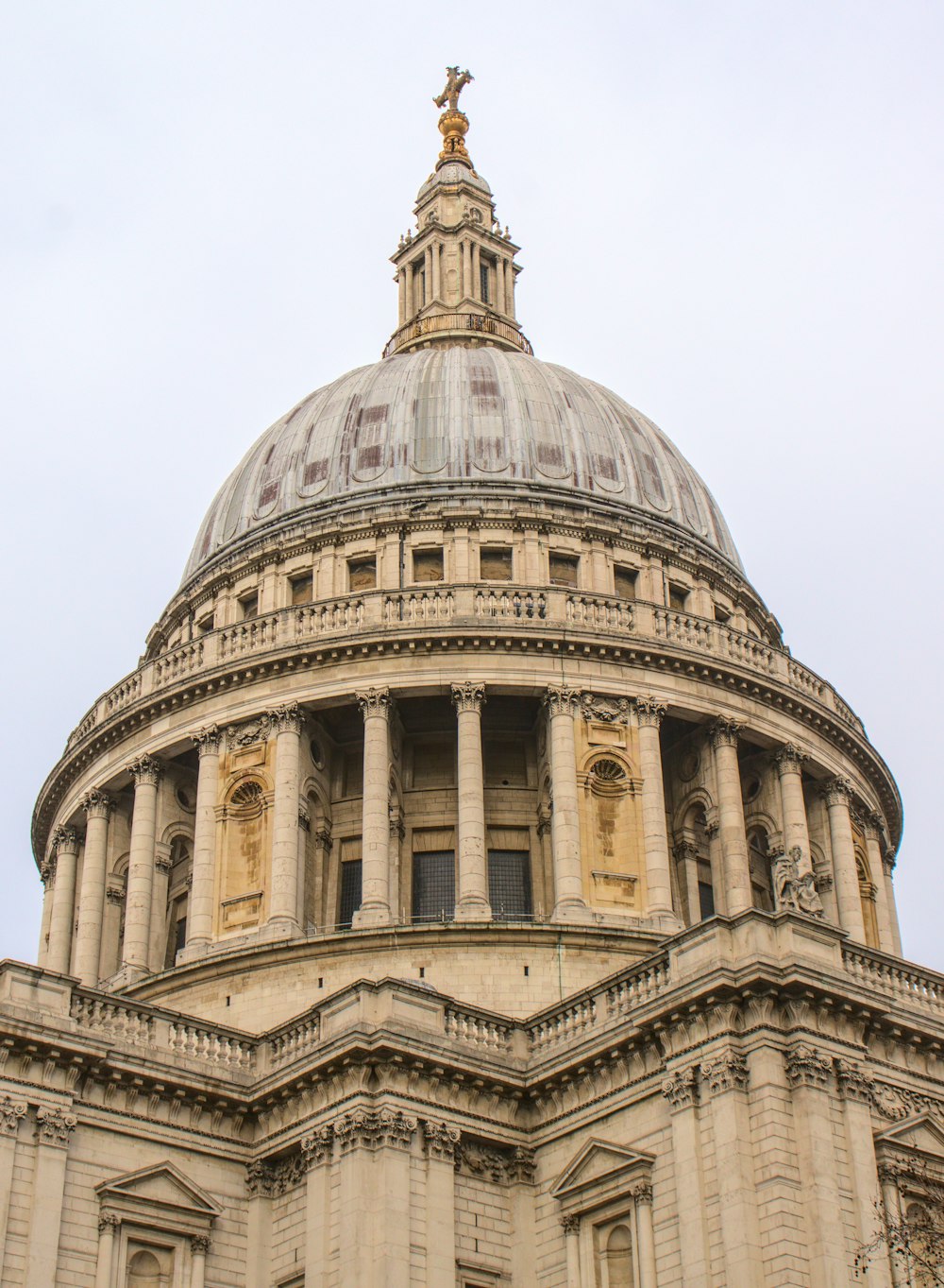 the dome of a building with a clock on it