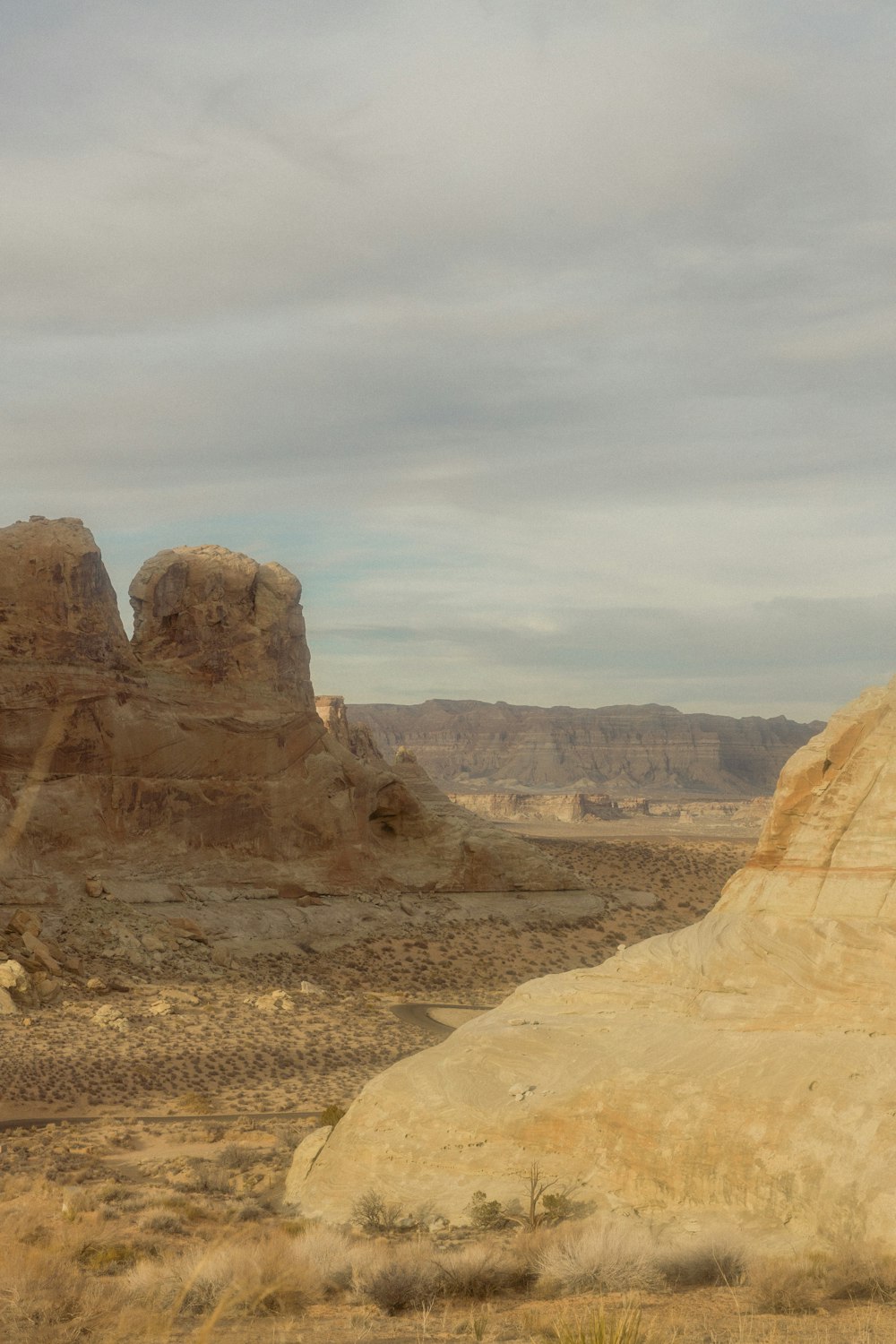 a man riding a horse in the desert