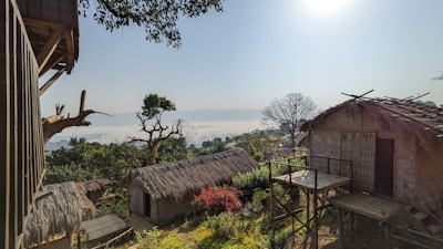 A scenic view of the Ethiopian countryside with traditional huts.