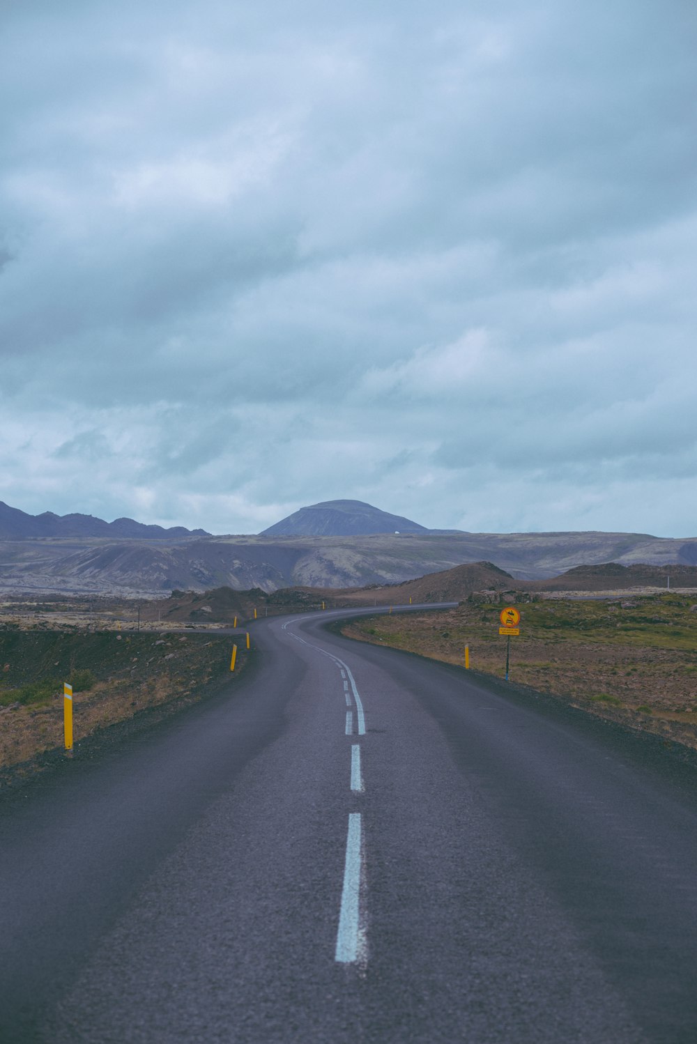 a long empty road in the middle of nowhere