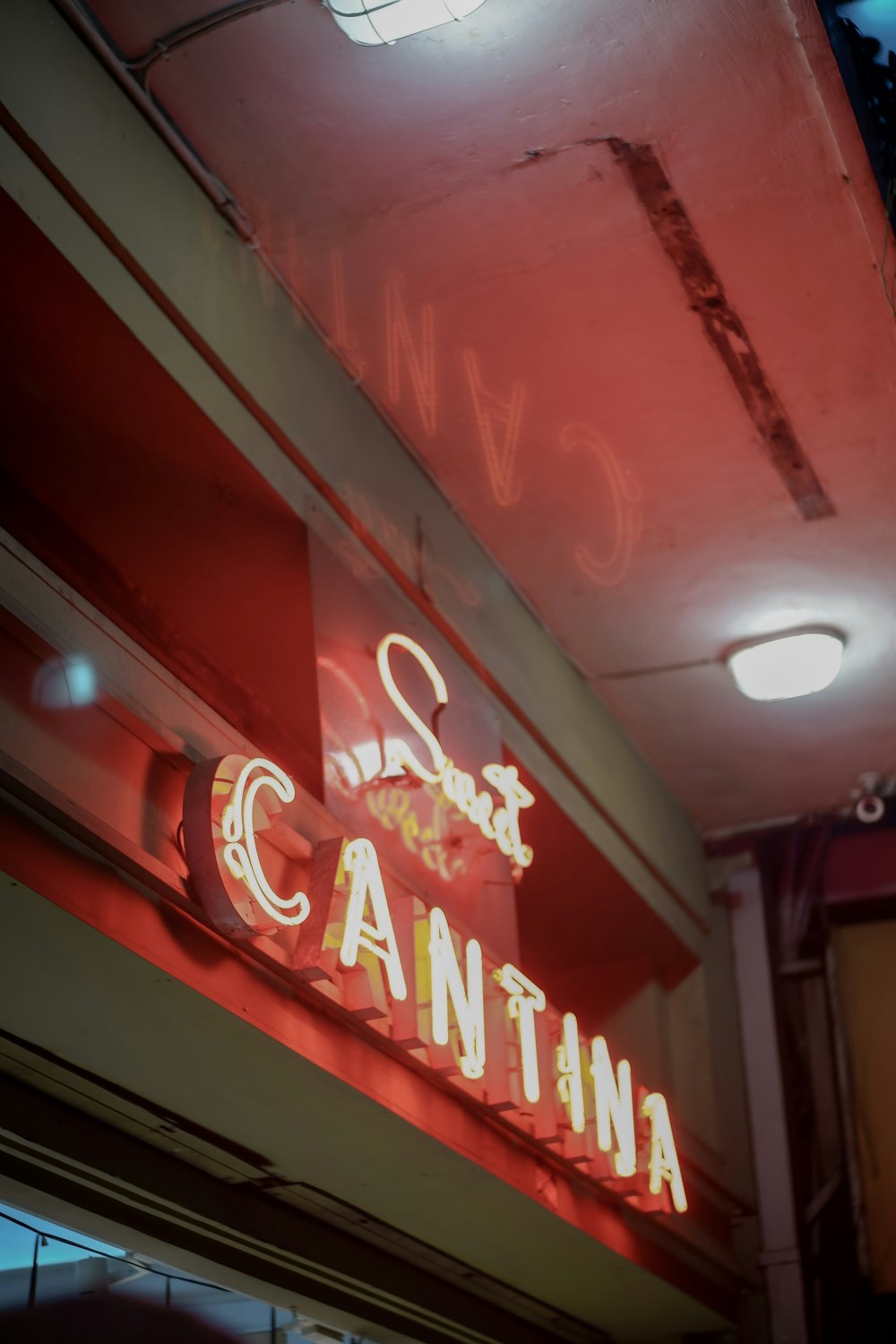 a red neon sign that says can't be can't
