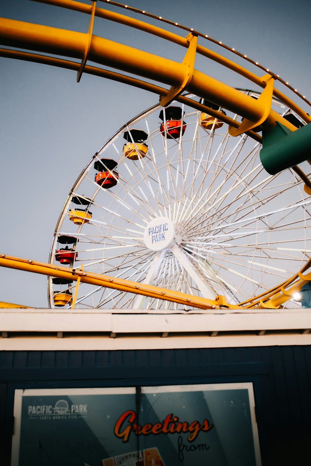 a large ferris wheel sitting next to a building