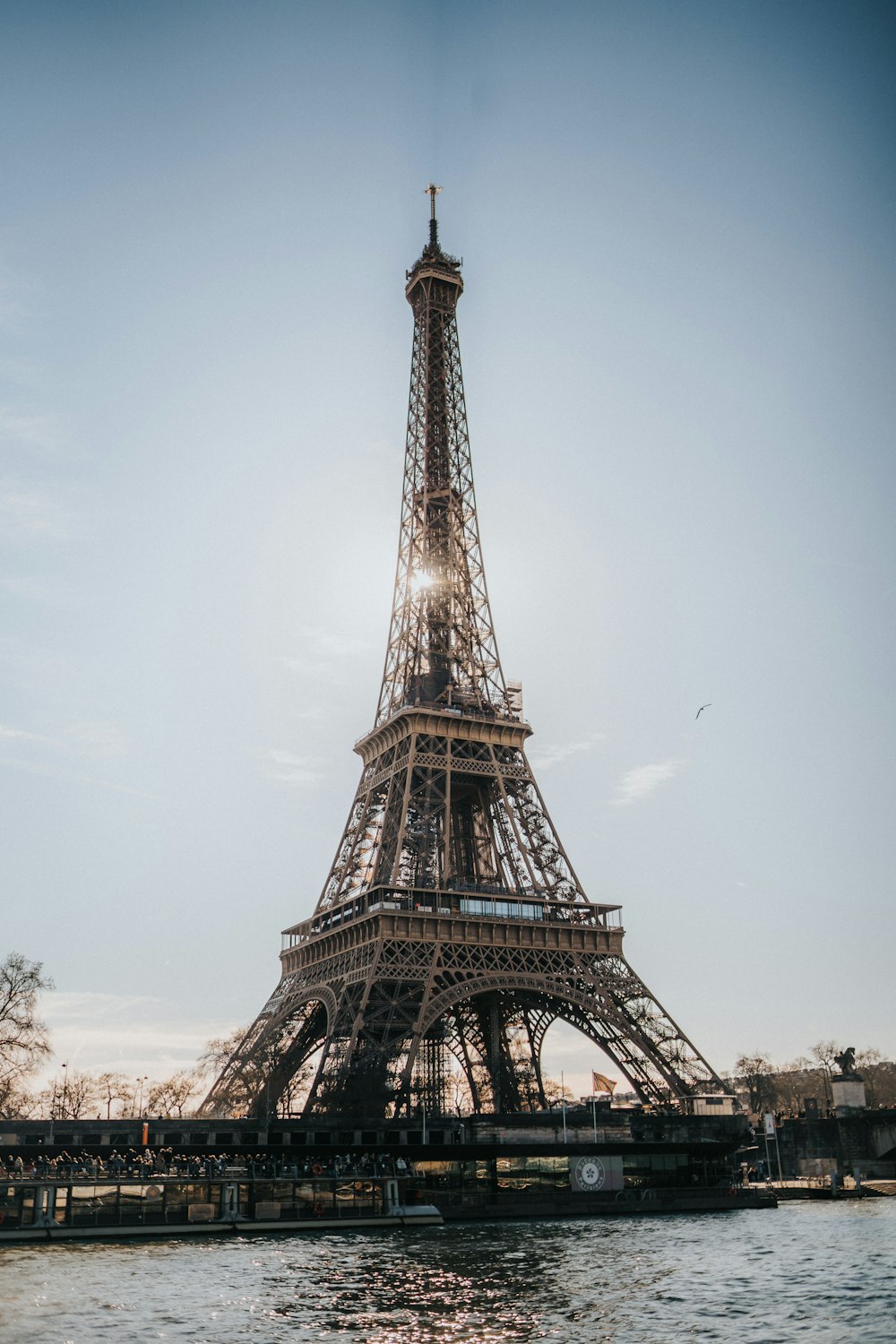 the eiffel tower towering over a body of water