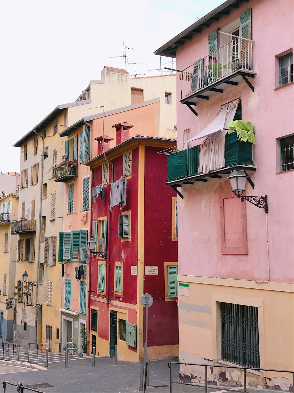 a row of buildings with balconies and balconies on them