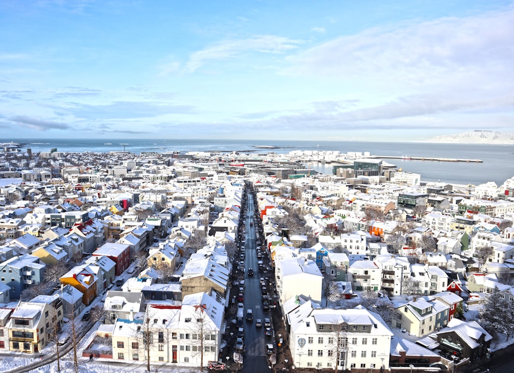 a view of a city with a lot of snow on the ground