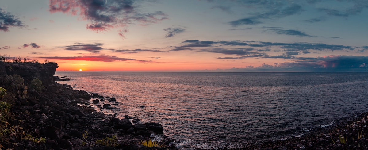 Mauritius coastline at sunset, the lagoon meeting the open Indian Ocean