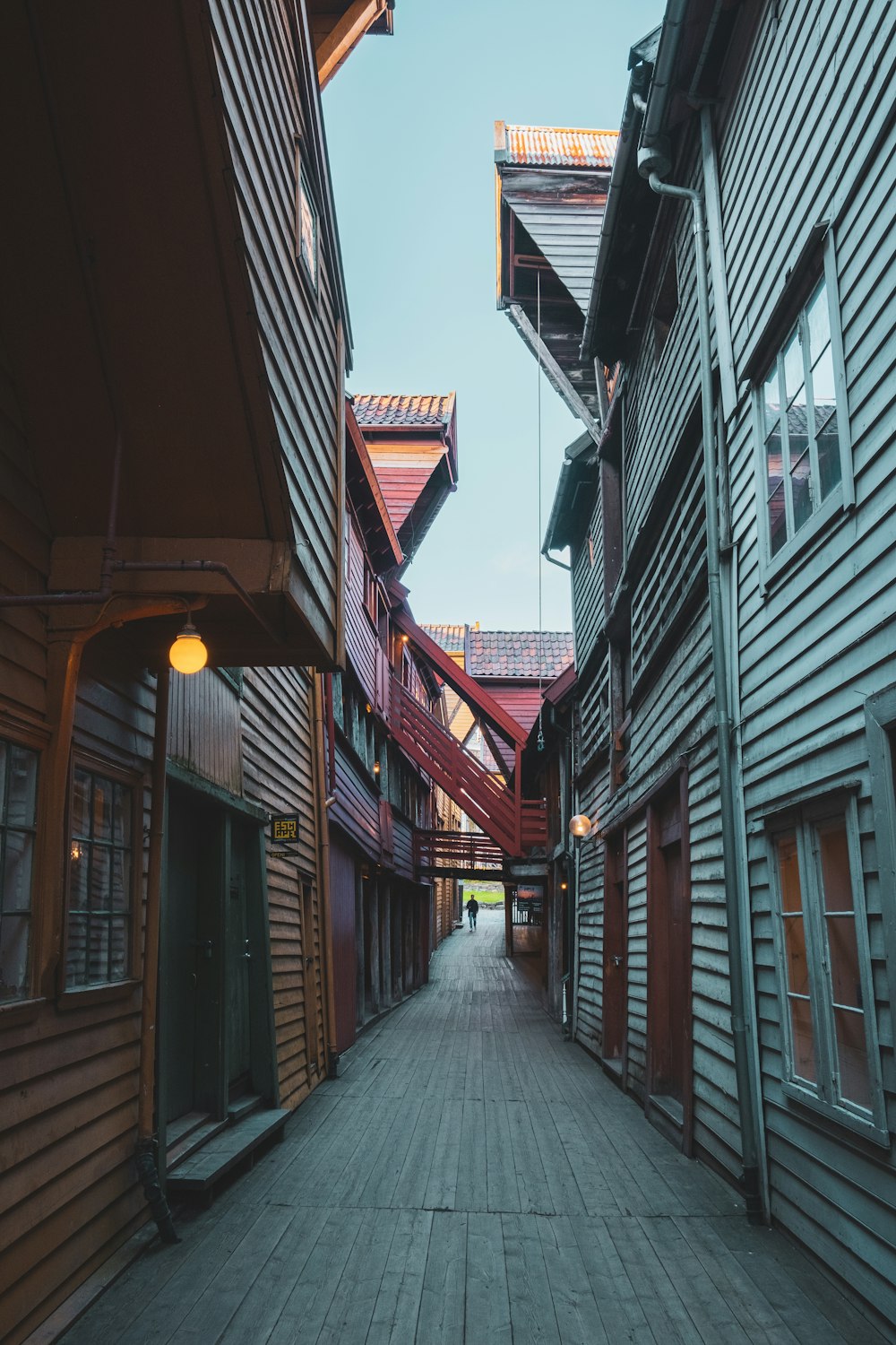 a train is parked on the side of a building