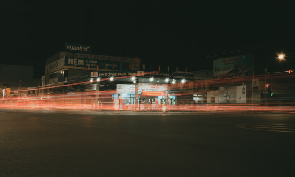 a blurry photo of a city street at night