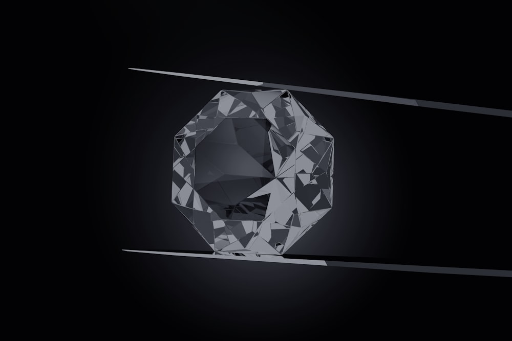 a black and white photo of a diamond