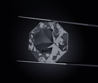 a black and white photo of a diamond