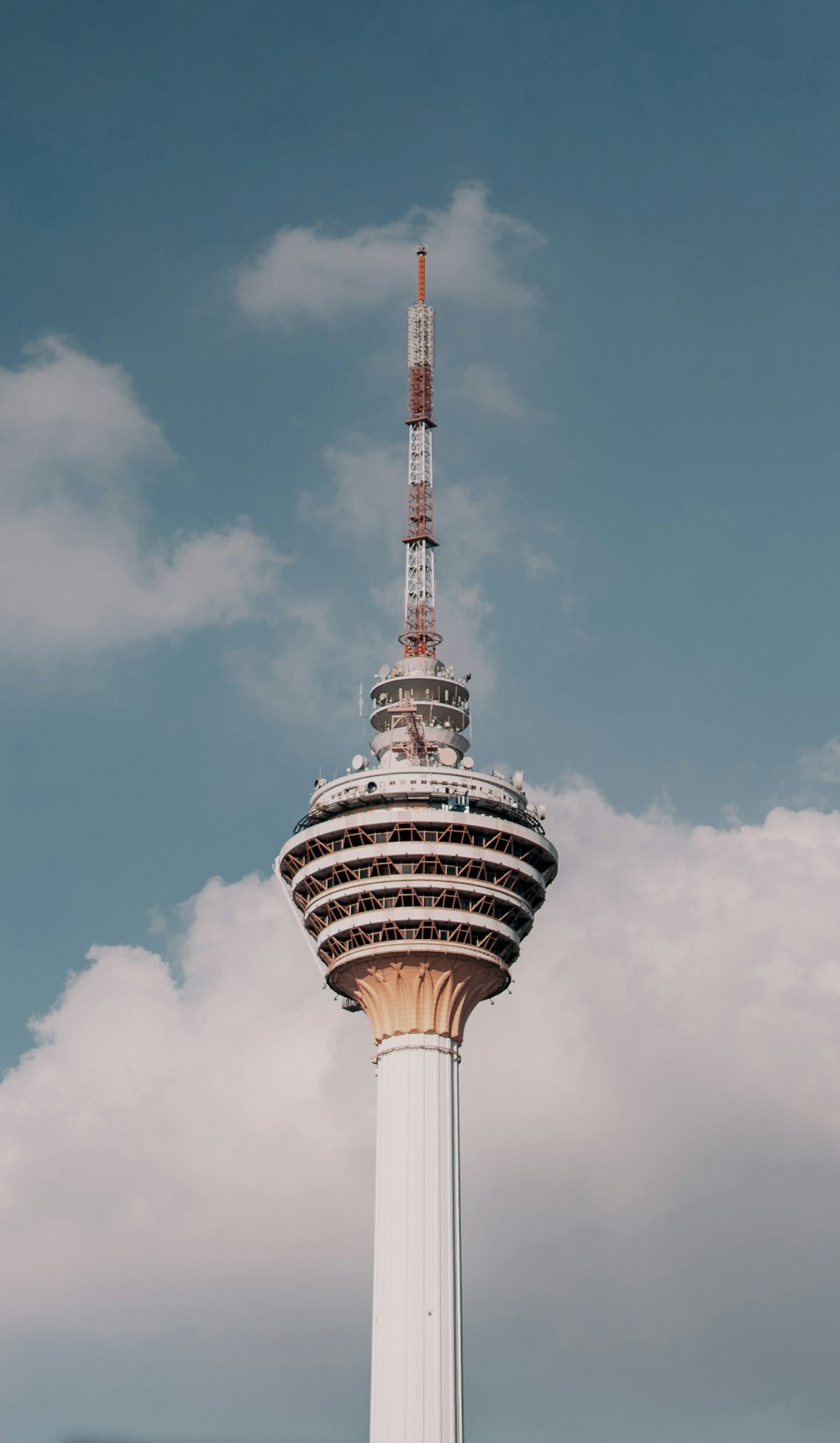 a tall tower with a sky background