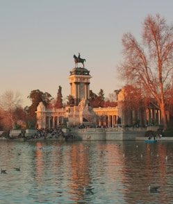 a large body of water with a statue on top of it