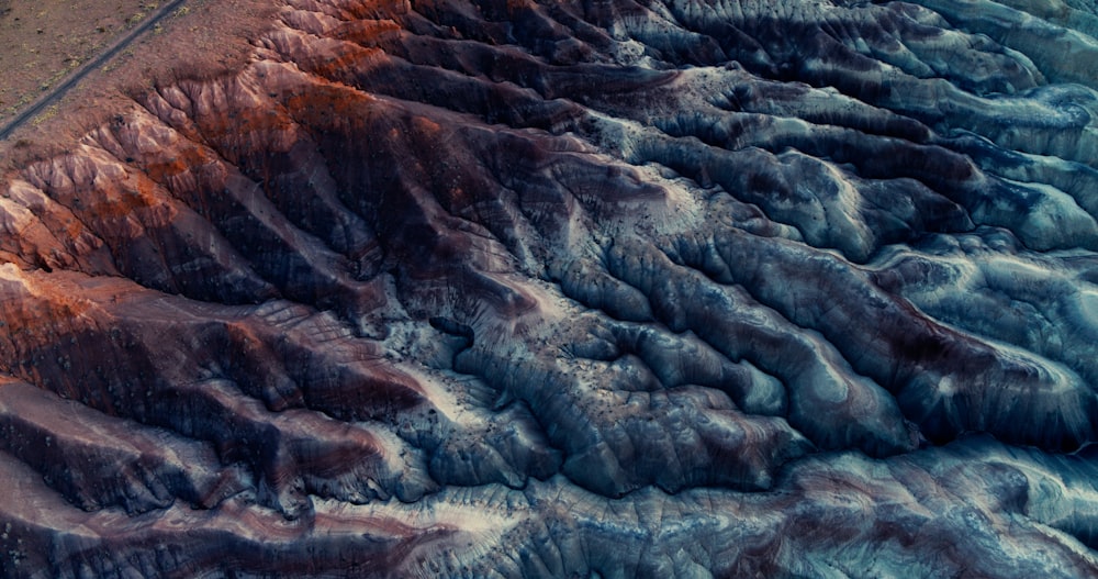 an aerial view of a mountain range in the desert