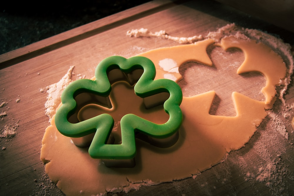 a cookie shaped like a four leaf clover