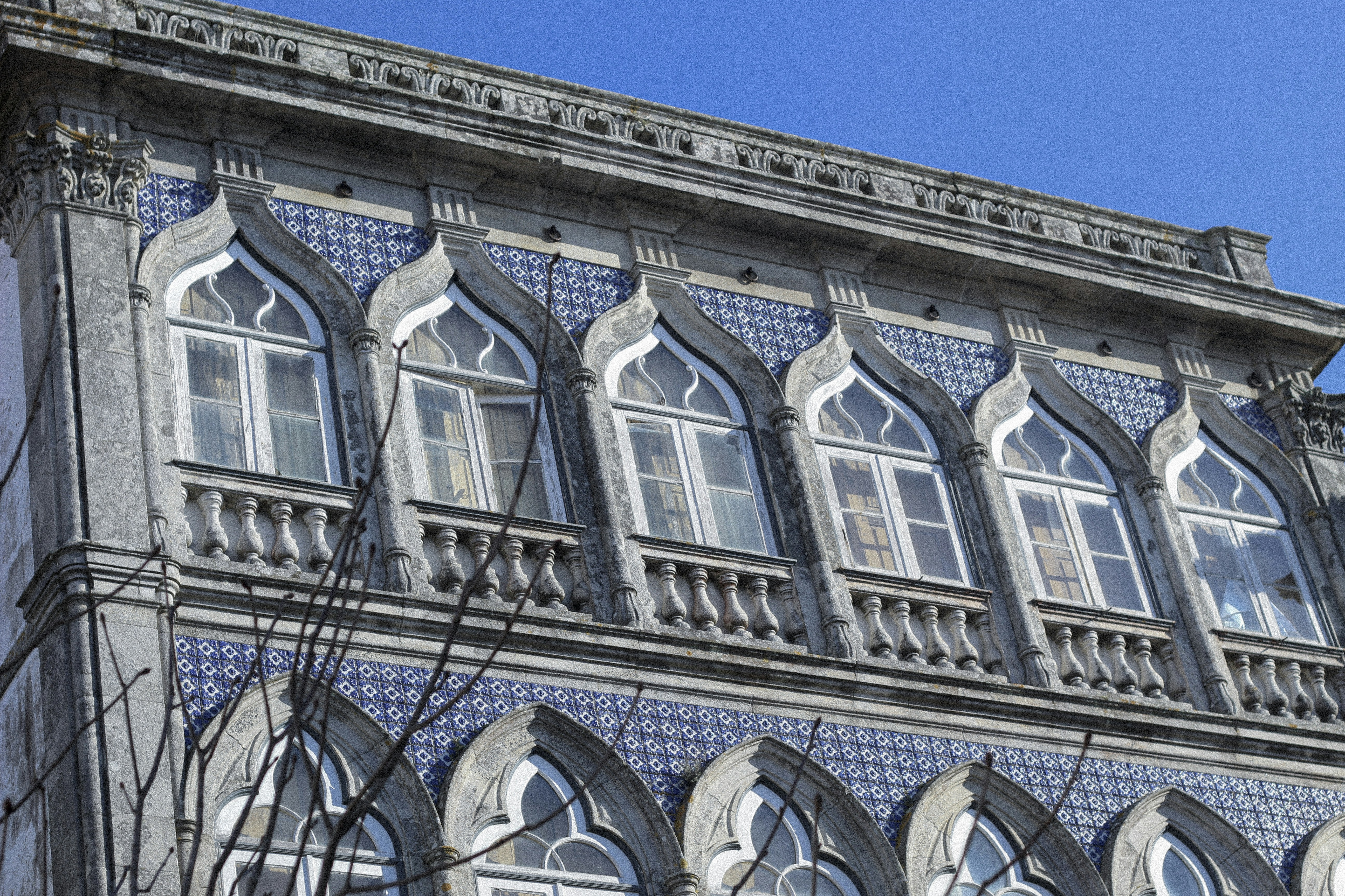 a large building with a clock on the side of it
