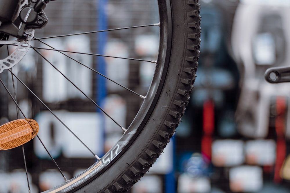 a close up of a bike tire and a chain