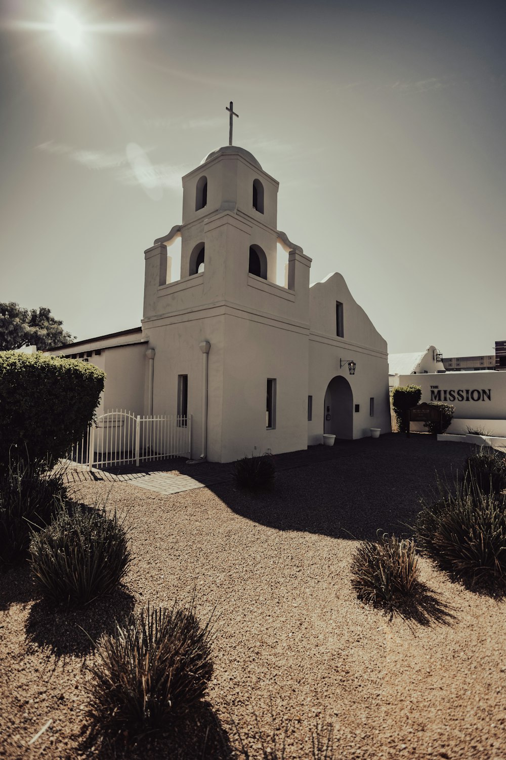 a church with a cross on the top of it