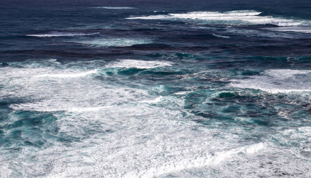 a view of the ocean from the top of a boat