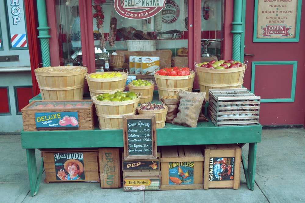 a display in front of a store filled with lots of fruit