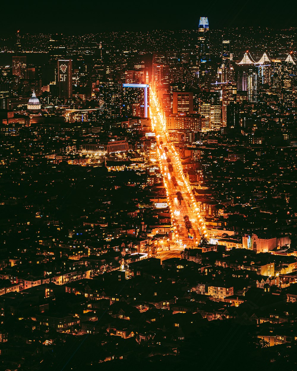 an aerial view of a city at night