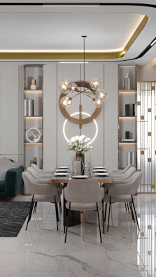Minimalist dining area with a sleek chandelier made of glass orbs reflecting soft light.