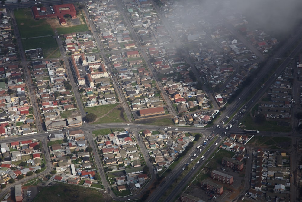 an aerial view of a city with lots of buildings