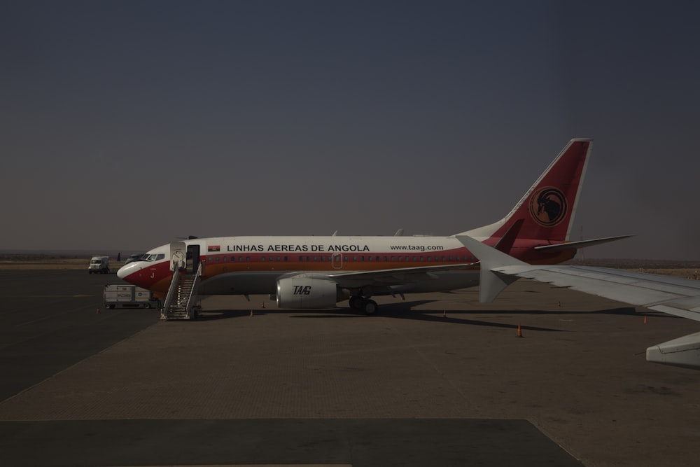 a large jetliner sitting on top of an airport tarmac