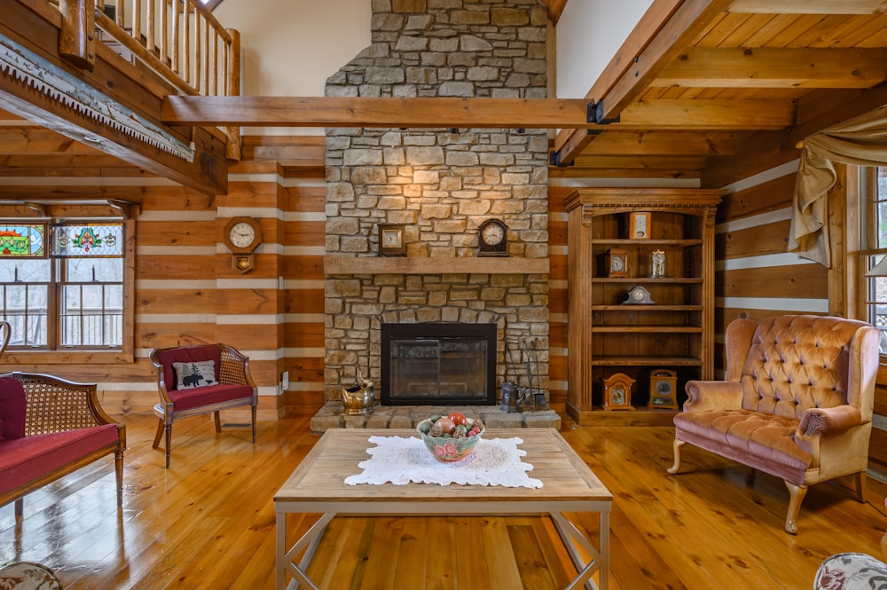 a living room filled with furniture and a fire place