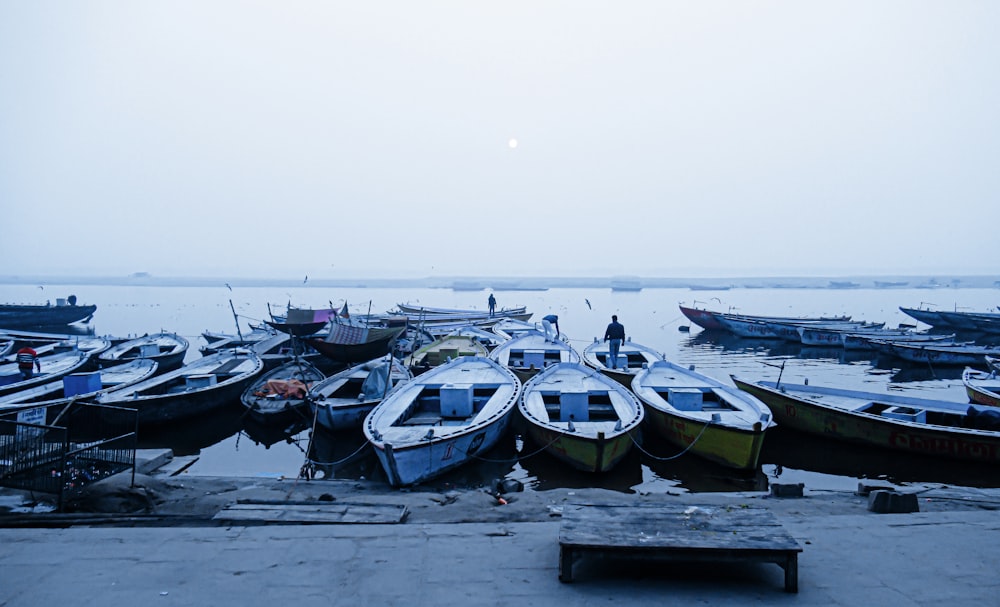 a bunch of boats that are sitting in the water