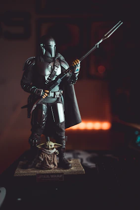 Close-up of a detailed 3D printed custom figure holding a photo, showcasing intricate craftsmanship.