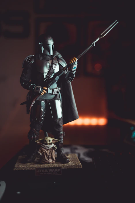 Close-up of a detailed 3D printed custom figure holding a photo, showcasing intricate craftsmanship.