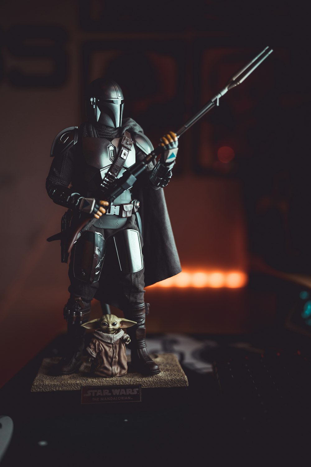 a star wars figurine is posed on a table