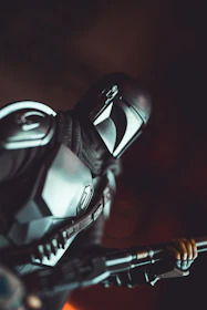 Close-up view of main characters gearing up for a mission, with dynamic lighting and high detail.