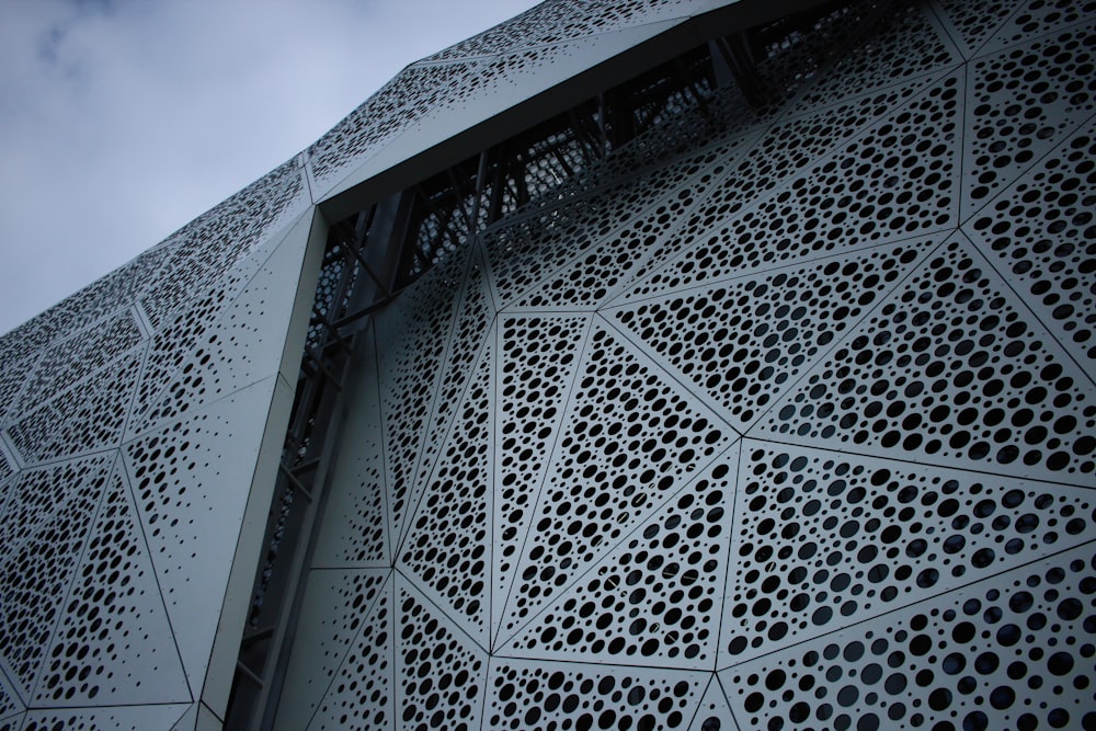 a close up of a building with a sky background